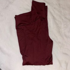 Red Polyester Leggings w/ Pocks and sheer spots on leg, Size S